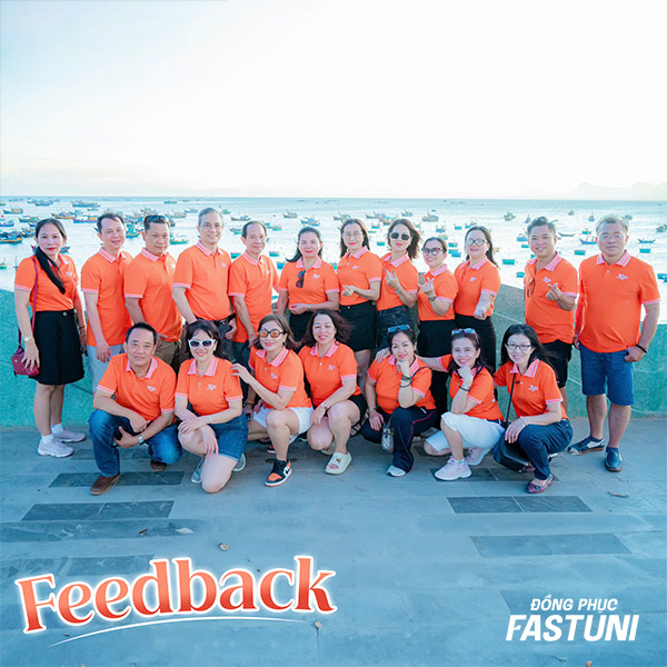 Nổi bật với mẫu áo polo đồng phục du lịch màu cam cổ dệt